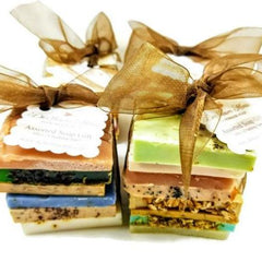 Assorted slices of vegan soap in grab bag tied with ribbon