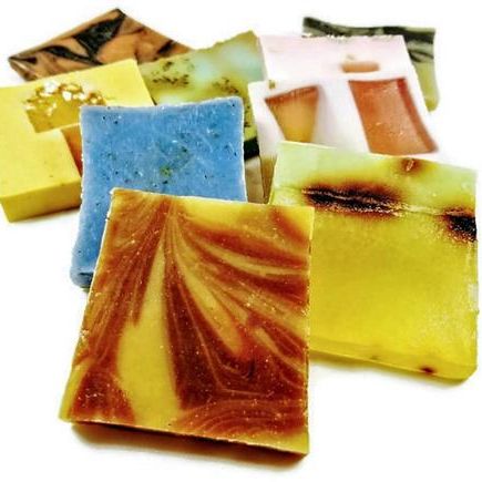 Assorted slices of vegan soap in grab bag tied with ribbon