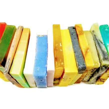 Assorted slices of vegan soap in grab bag tied with ribbon